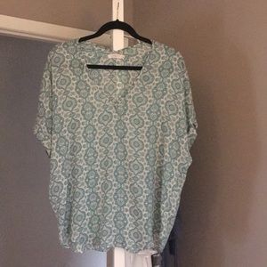 Loose fitting, v neck top.